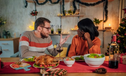 Unhappy couple arguing over dinner