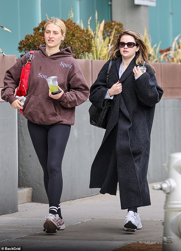 Underneath her chic outerwear, Gomez wore a gray fluffy sweater, black leggings and white sneakers.  She was spotted carrying a padded leather tote and shielding her eyes with oval Chanel sunglasses