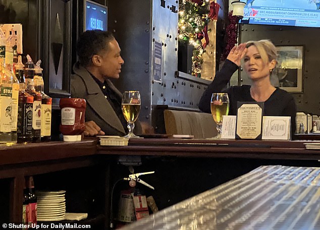 The day before heading out on a romantic getaway upstate in November 2022, Robach and Holmes were seen deep in conversation at a bar in Times Square.