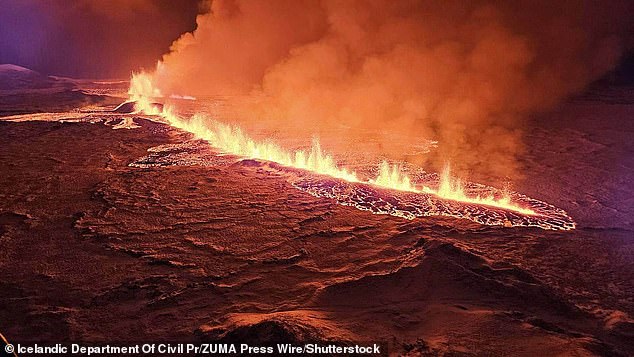 Lava flows on a hill near Grindavik on Iceland's Reykjanes Peninsula after a volcanic eruption on Monday evening