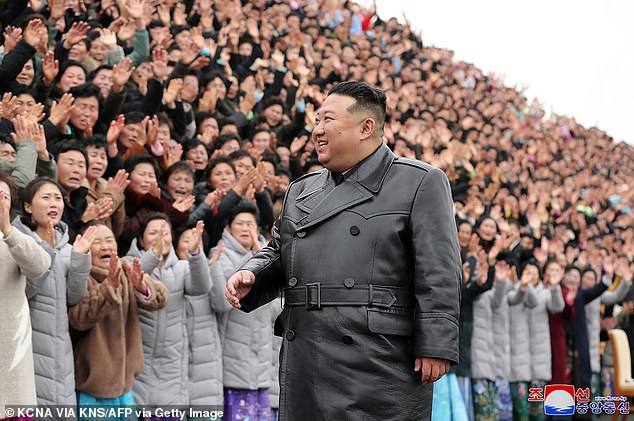 Kim took part in a commemorative photo with participants at the Fifth National Mothers' Convention in Pyongyang earlier this month