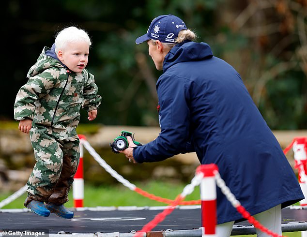 Zara Tindall accompanies son Lucas on a trampoline at Gatcombe Park this year