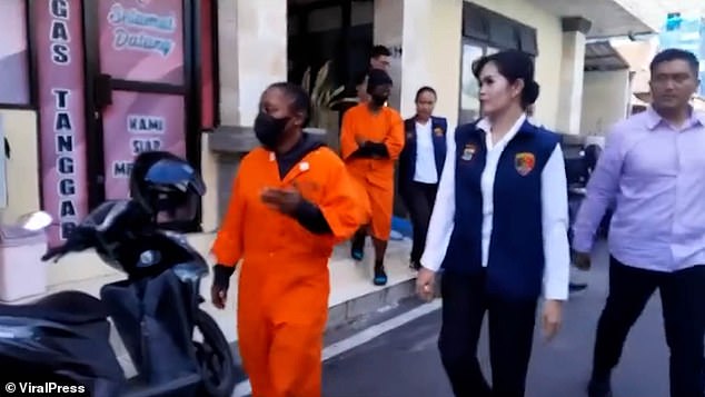 Indonesian police escorted the two women after their arrest