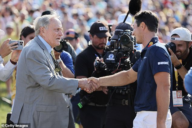 Hovland greets tournament host and 18-time major winner Jack Nicklaus after his victory