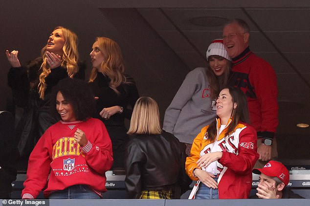 Taylor and Scott appear to have become Chiefs fans since she started dating Travis