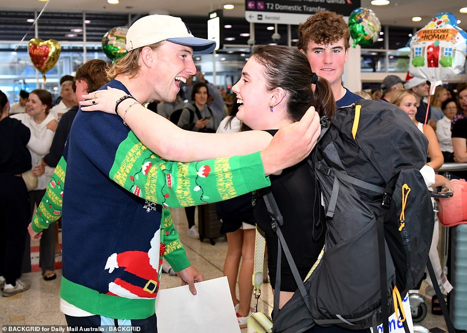 Brothers are seen welcoming their sister Trixi home