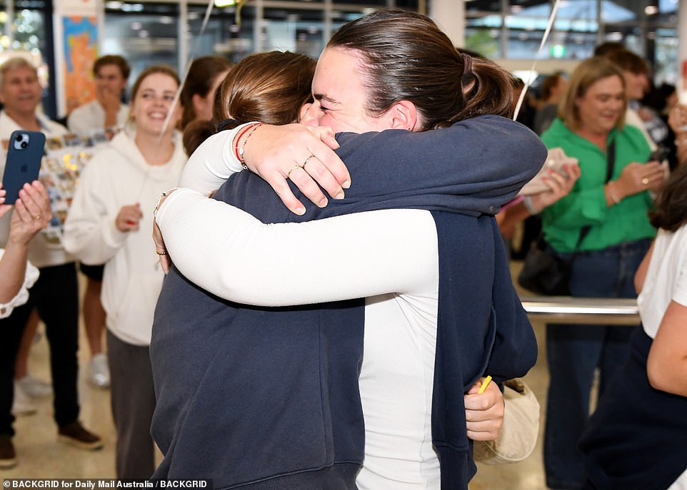 1703089038 584 Sydney Airport Lovers embrace in emotional scenes ahead of the