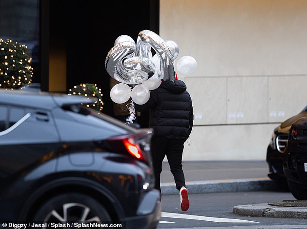 Earlier in the day, silver '60' balloons were delivered to their luxury hotel as they made sure to commemorate the occasion