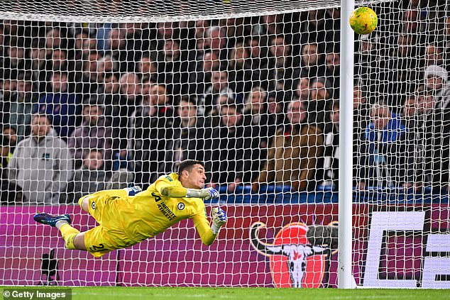 Chelsea advanced to the Carabao Cup semi-finals when Djordje Petrovic saved Matt Ritchie's penalty