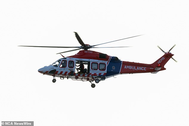 A helicopter ambulance is pictured at the scene near Portland on Victoria's south-west coast