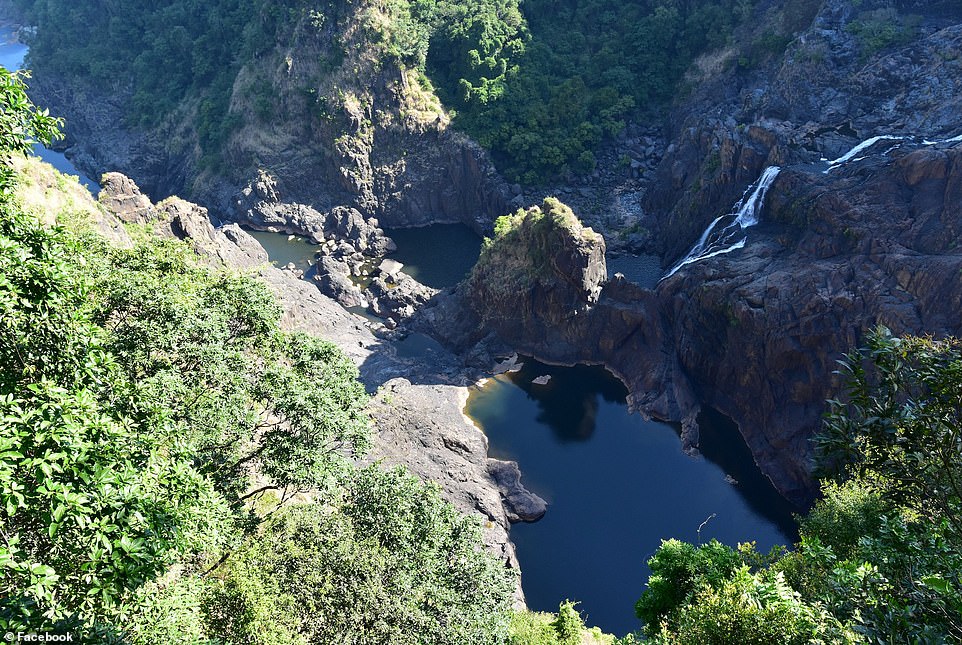 Far north Queensland has received heavy rainfall from the cyclone system, with Cairns seeing 268mm on Sunday (pictured, Barron Falls on December 10)