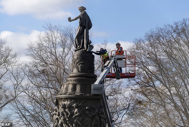 U.S. District Judge Rossie Alston issued a temporary injunction Monday after receiving an urgent call from the monument's supporters saying graves were being desecrated as contractors began work to remove the monument.