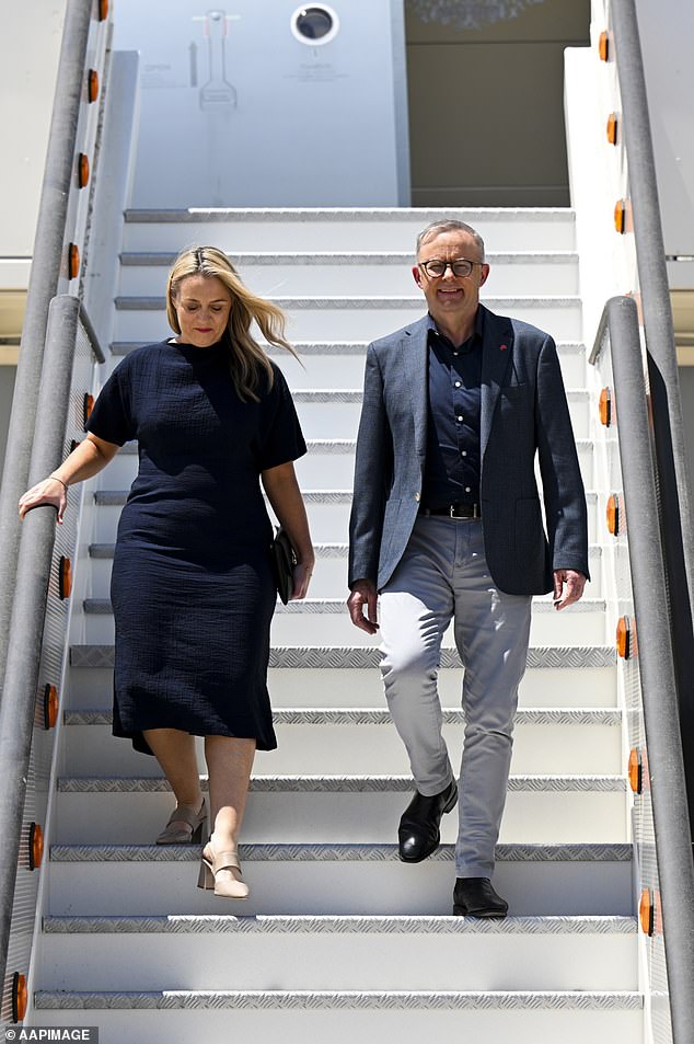 Anthony Albanese and partner Jodie Haydon disembark from their plane after arriving at Torrejon Air Base for the NATO Leaders' Summit in Madrid, Spain, Monday, June 27, 2022