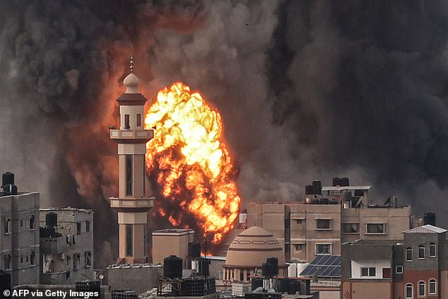 A fireball erupts after the Israeli attack on Rafah in the southern Gaza Strip on December 20, as the conflict shows no signs of ending