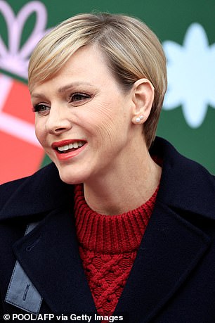 Most children only dream of meeting a real prince and princess - but today the lucky youngsters were welcomed by Princess Charlene (pictured) and Prince Albert of Monaco at the Prince's Palace