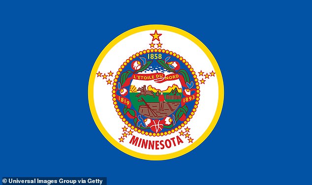 Old flag: The flag's previous design - which dates to the 1960s - featured an image of a Native American on horseback in the center of the seal