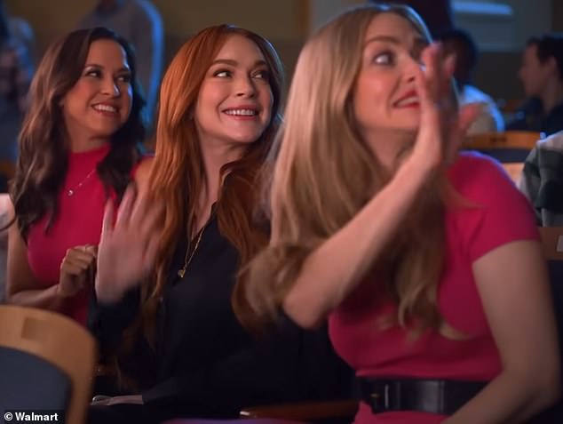 Lindsay Lohan (center), Amanda Seyfried (right) and Lacey Chabert (left) all came together for a Walmart ad last month to promote the big box chain's Black Friday sales
