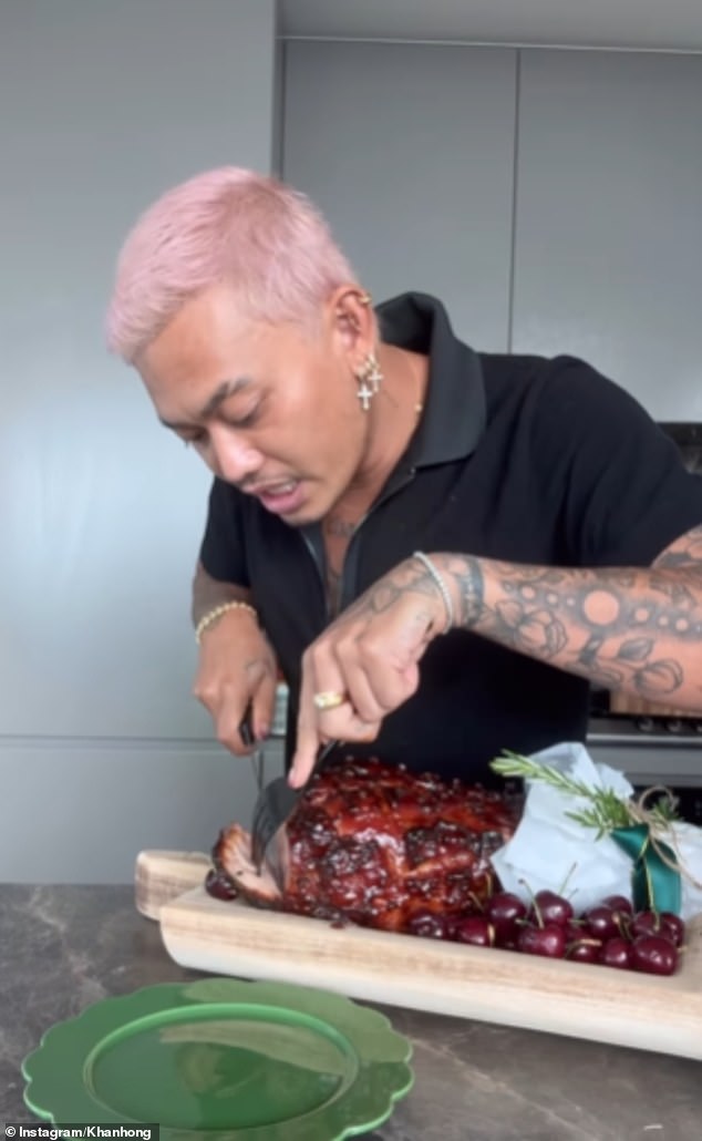 In the video, Khanh cuts the skin off the ham, coats it with cloves and pours the cherry and gin glaze over it before baking.