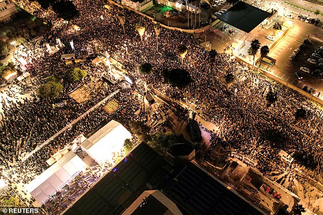 People gather for the release of hostages kidnapped during the deadly October 7 attack by Palestinian Islamist group Hamas, amid the ongoing Israel-Hamas conflict, in Tel Aviv, Israel, on December 16, 2023