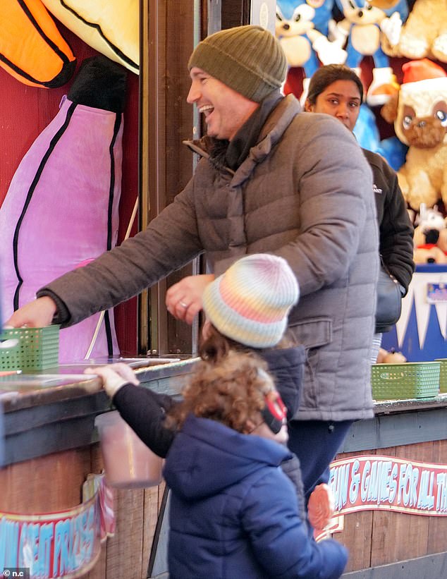 Frank flashed a big smile as he enjoyed quality time with his kids