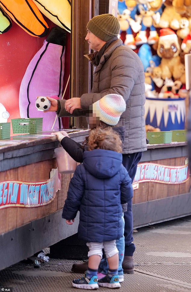 Freddie and Patricia watched as their father demonstrated his skills