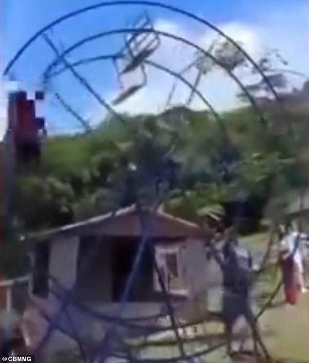 Maria do Carmo is seen falling from a Ferris wheel at a restaurant's children's playground in Brazil