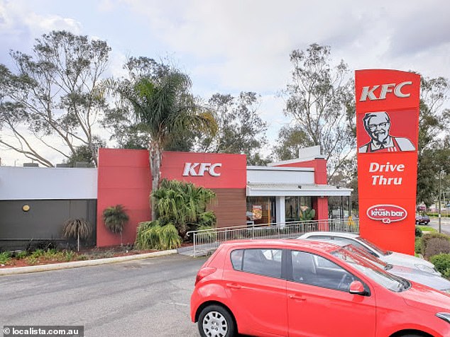 Pictured are cars parked by car park at KFC's Mooroolbark branch in Melbourne