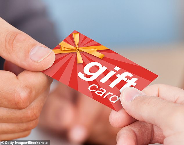 Police are warning Americans about a rise in a holiday scam called 'card draining' – which is leading to people receiving totally worthless gift cards