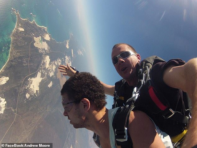 Moore (left) recorded a charity skydive on his Facebook page in 2012