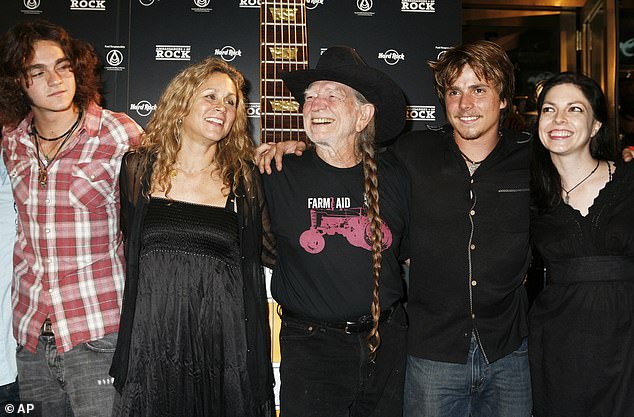 Willie poses with his wife Annie, second from left, and children Micah, Lukas and Amy, from left to right;  seen in 2007