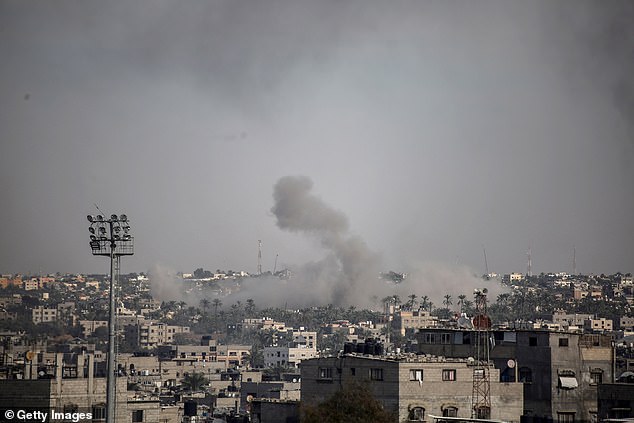 Smoke rising due to Israeli airstrikes on the town of Khan Yunis on December 20, 2023 in Khan Yunis, Gaza