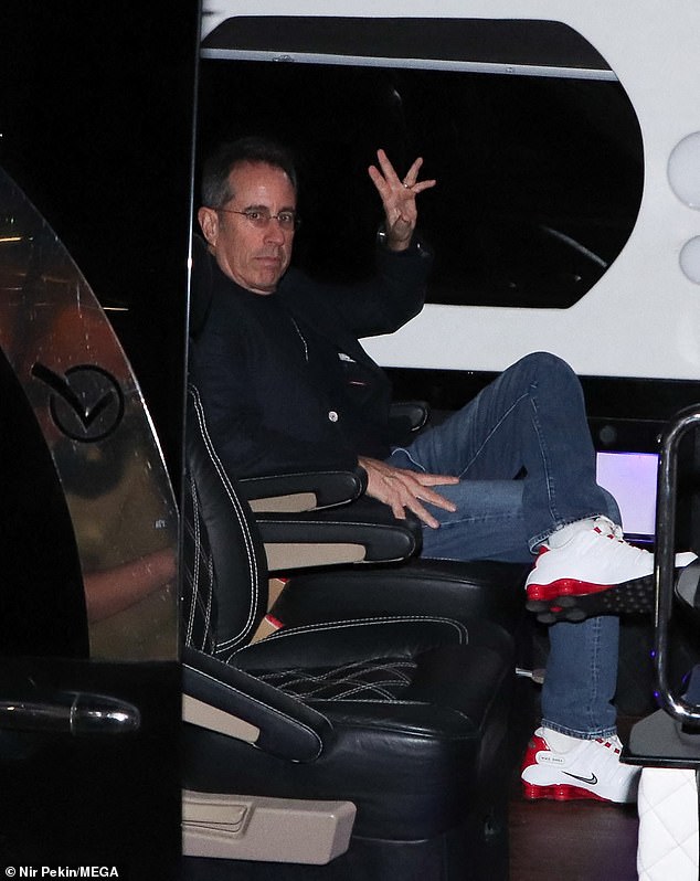 Seinfeld pictured in a van waving goodbye as he traveled to his next stop on his Israel tour.  The comedian arrived in the country on Monday