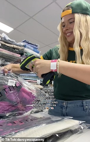 During a tour of the office, she began packing an order in the packing room