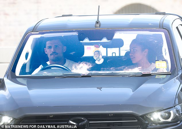 The lovebirds were happily chatting with each other as they parked the car