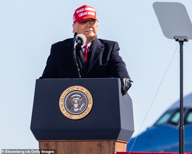 Donald Trump is seen at a campaign rally on November 2, 2020. On November 17, he reportedly called two election officials in Michigan to try to get them to block the certification of the votes.