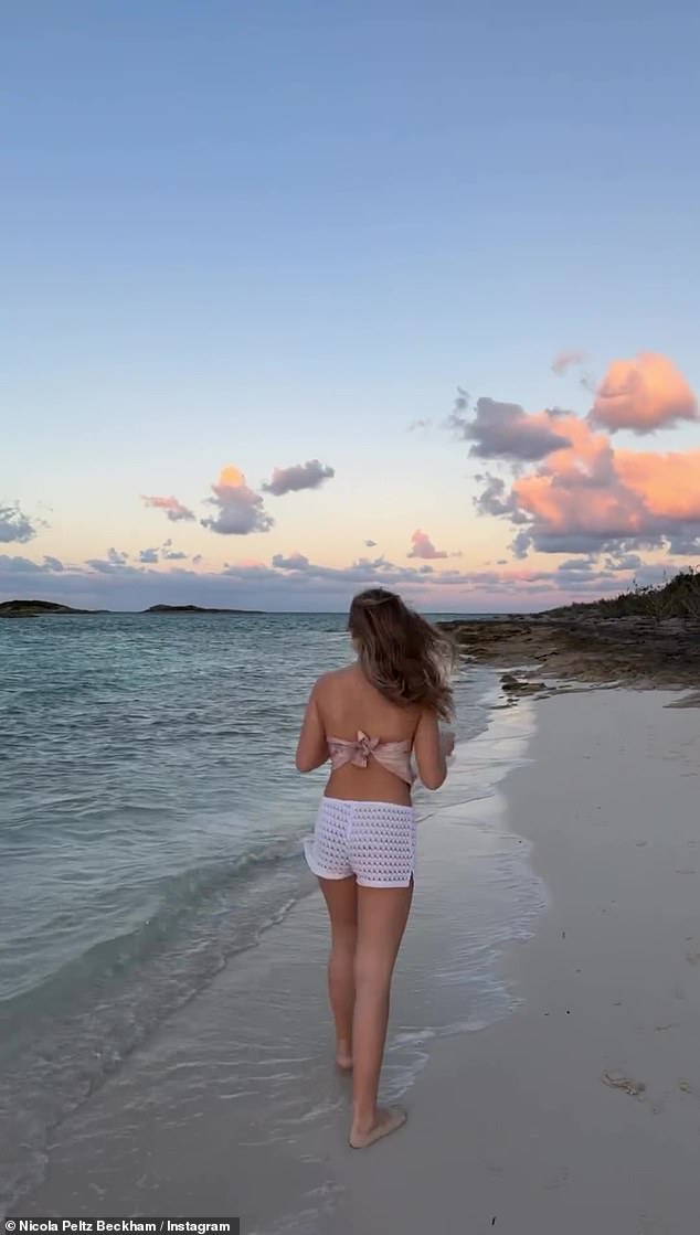 She was also seen in the video walking along the seafront in a trendy bandana style top with shorts, showing that she has adopted her mother's legendary fashion sense