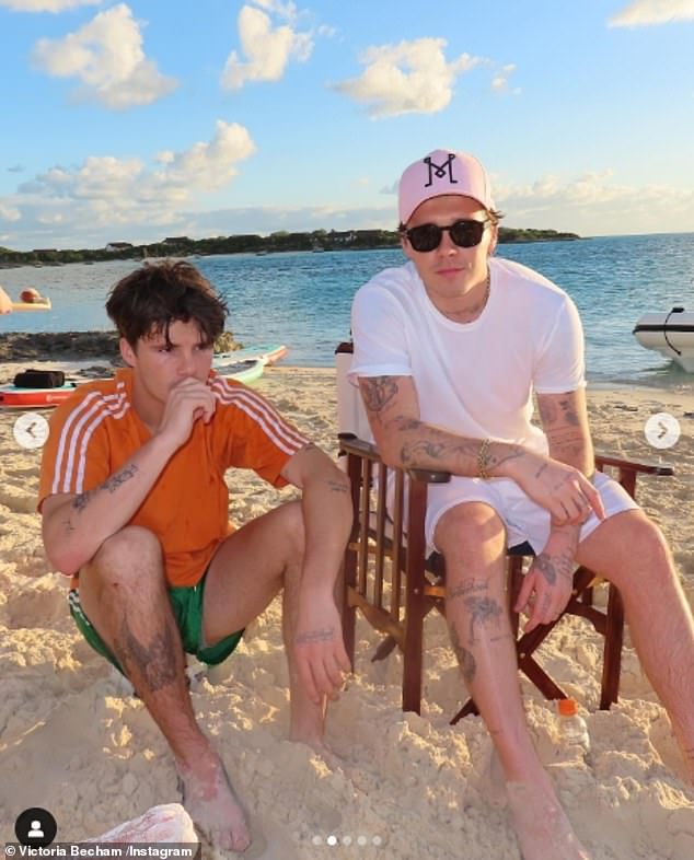 Brooklyn and his brother Cruz sat on the sand