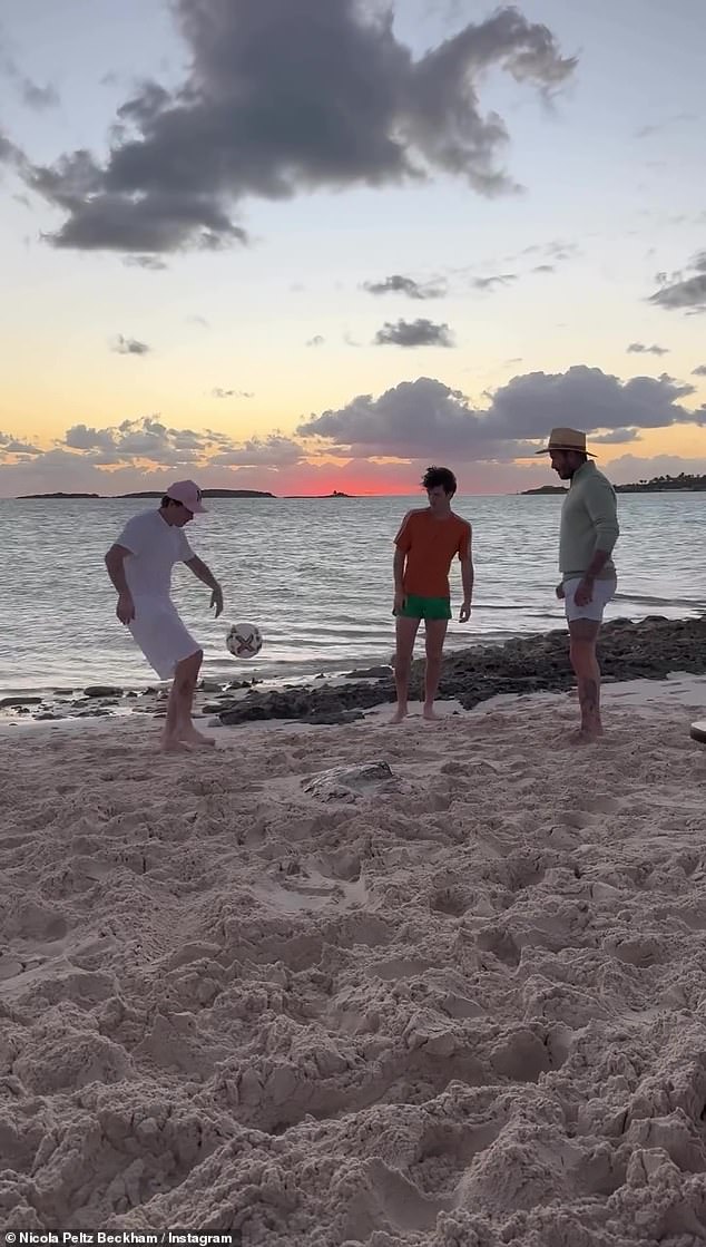 David showed his sons how it's done while they enjoyed a kickabout