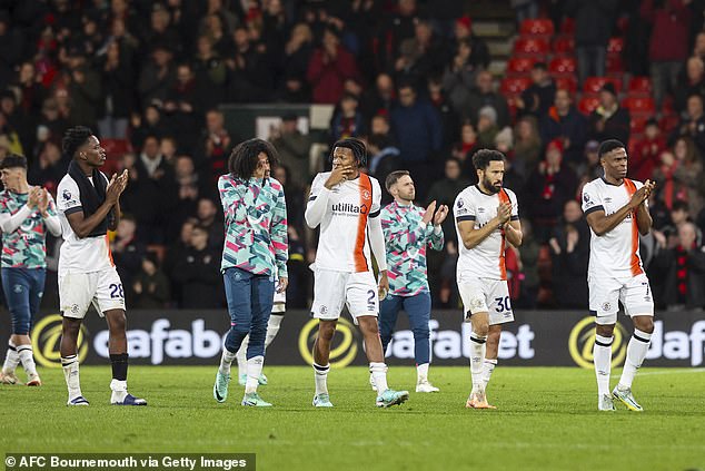 Luton's players were clearly in distress after the match at the Vitality Stadium was abandoned