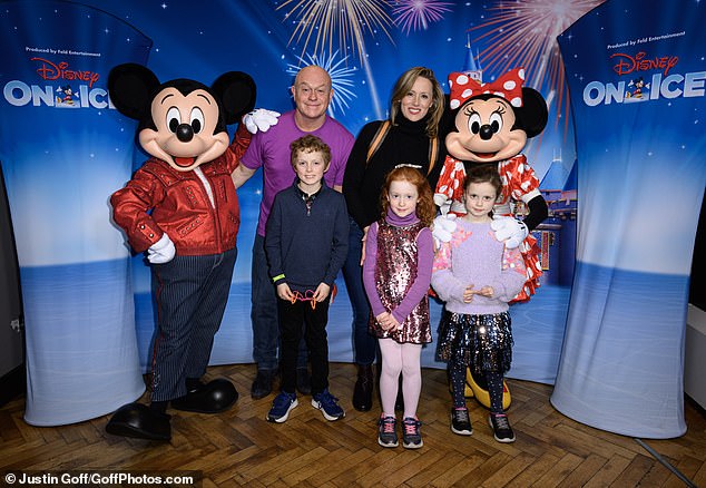 Ross Kemp and his family were among guests at the festive event, squeezing between Mickey and Minnie for an adorable video