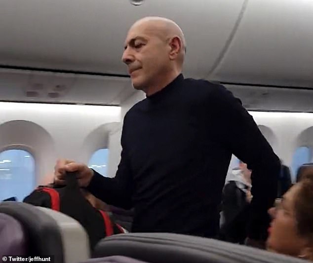 In April, a flight from New Jersey to Tel Aviv was forced to turn back after a passenger (above) refused to get up from the flight attendant's seat while waiting in the restroom.