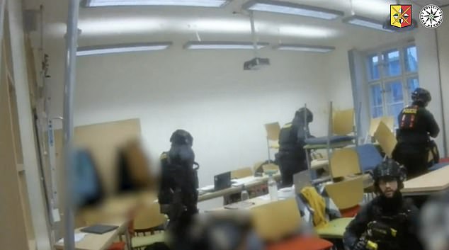 Harrowing video shows other police officers discovering injured students in a classroom and desperately trying to stop their blood loss before evacuating them from the building