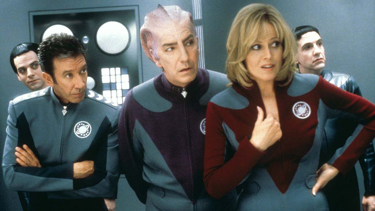 Tim Allen, Alan Rickman and Sigourney Weaver wear Star Fleet-esque uniforms in Galaxy Quest.