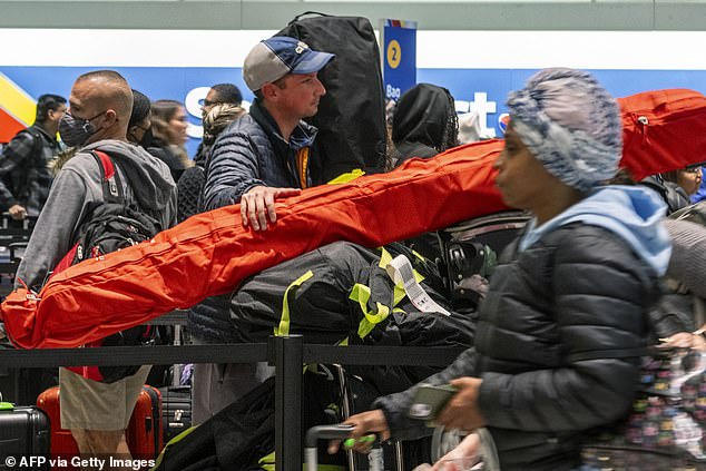 At Washington International Thurgood Marshall Airport in Linthicum, lines from Maryland began snaking through the baggage claim area on Friday