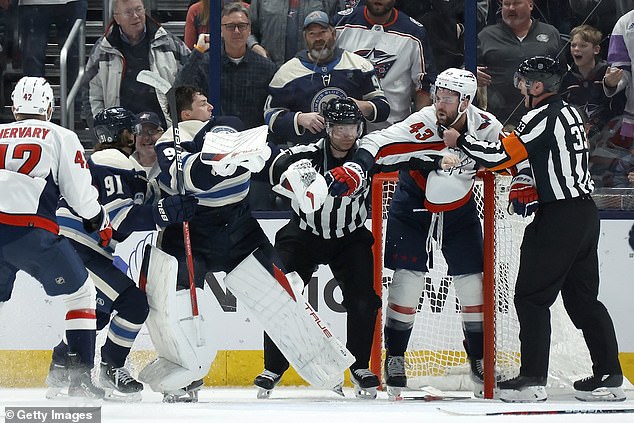 Wilson got up and pushed Merzlikins away before he skated away and the officials intervened