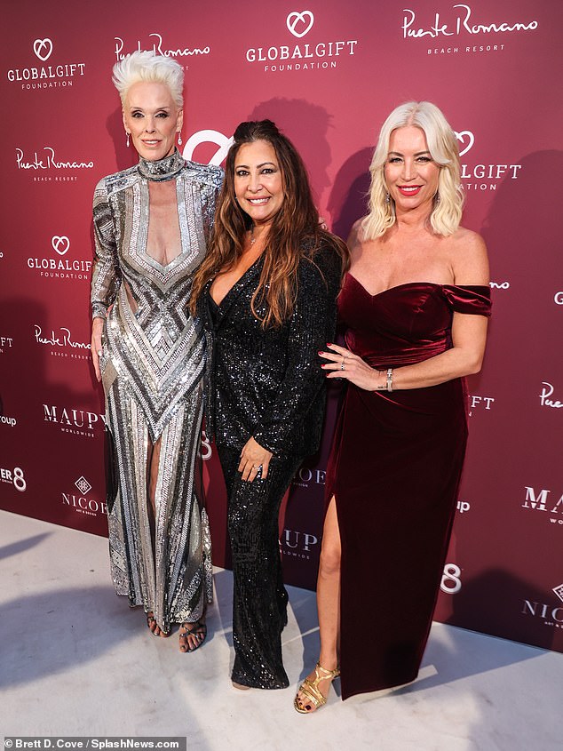 The stars posed with Global Gift Foundation founder Maria Bravo (center) at the event.