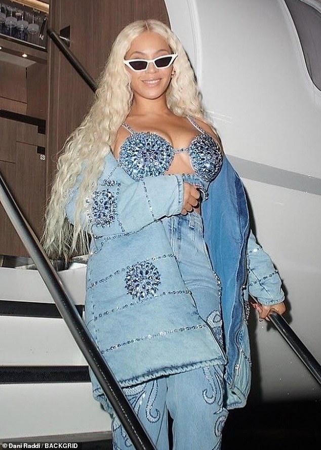 The 42-year-old superstar put on a stunning show in a denim-on-denim look from Brazilian brand PatBO as she descended the stairs of her private jet