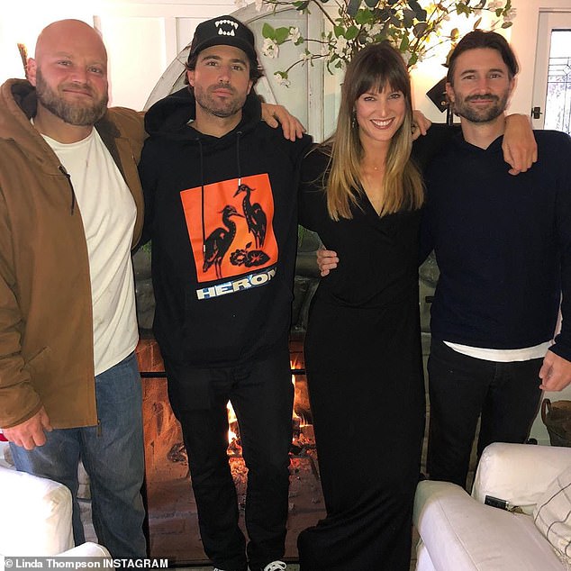 The couple also share an older son, Burt Jenner (L), 45, whose name wasn't even in the photo