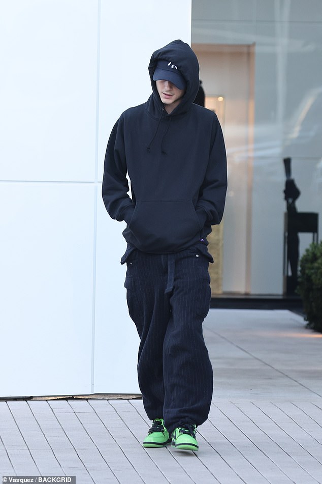 While Kylie posted family throwbacks, her boyfriend Timothée Chalamet, 27, kept a low profile while shopping at a Chanel boutique in Beverly Hills on Friday.