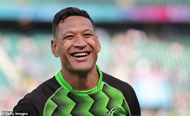 Rugby Australia ripped up Folau's Wallabies contract after he wrote in an Instagram post in January 2019 that 'hell awaits gays' (he is pictured in May)